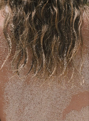 What Summer Actually Does to Your Scalp and Hair