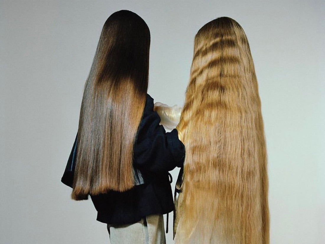 Image of two women with long hair