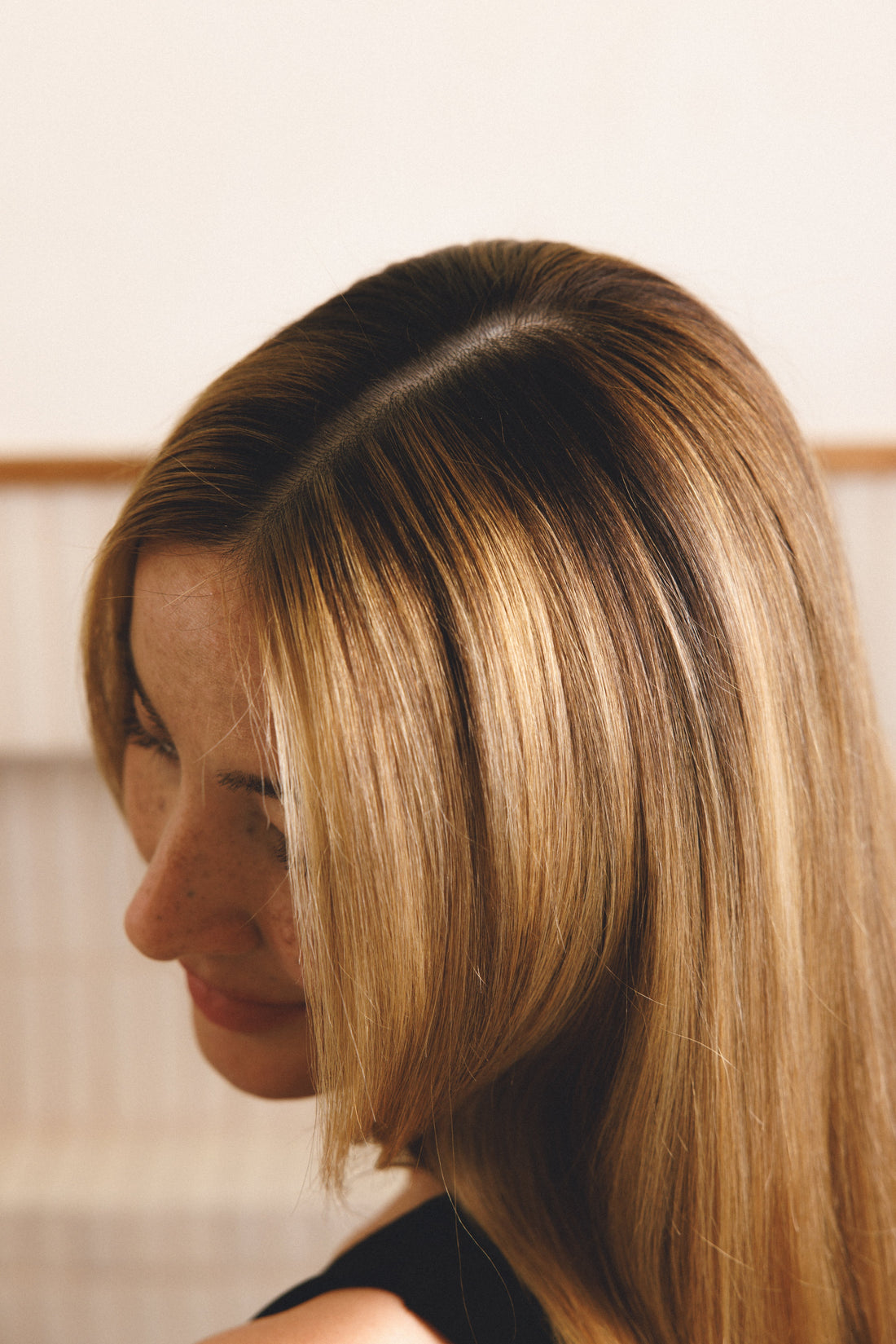 Image showing a woman enjoying her clean, healthy hair with no flakes