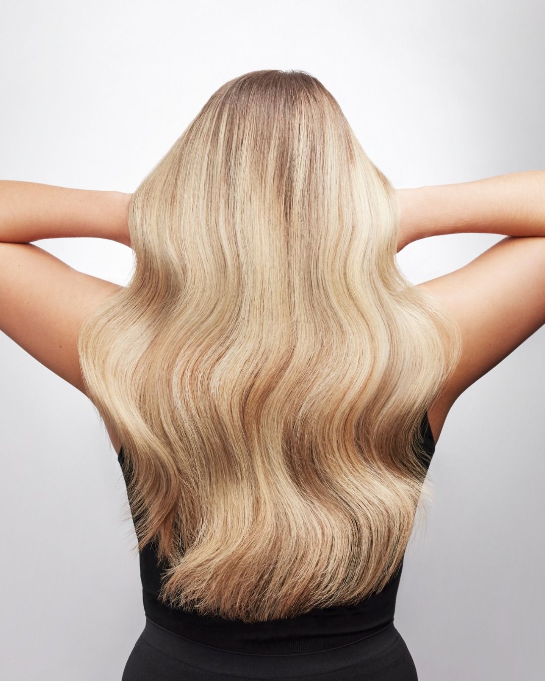 Image of a woman with long, blonde hair