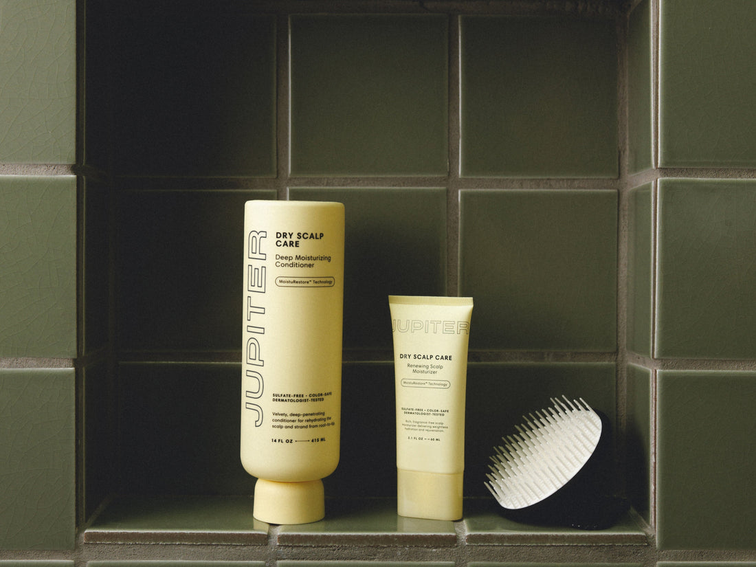 Photo of the Daily Hydration Conditioner, Moisturizer and Scalp Brush in the shower